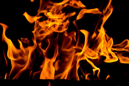 Fire flames on black backgroundの写真素材