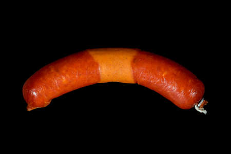 Smoked sausage isolated on blackの写真素材