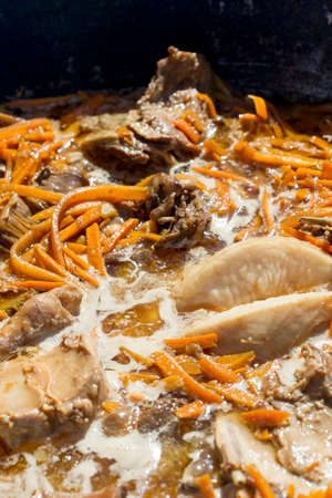 Cooking pilaf Uzbek nationalの写真素材