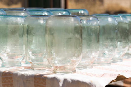 stylized glass jars under the sunの写真素材