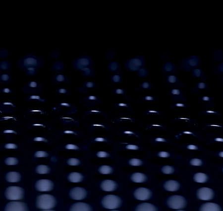 Background steel plate with round holesの写真素材