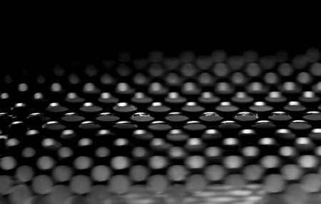 Background steel plate with round holesの写真素材