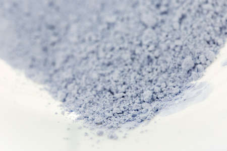 Blue powder gypsum dental on white backgroundの写真素材