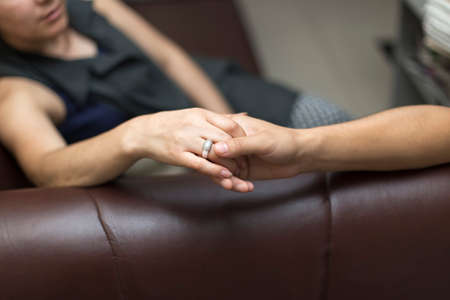 A man wants to kiss a girl's hands