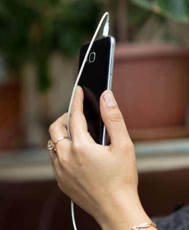 woman hand phoneの写真素材