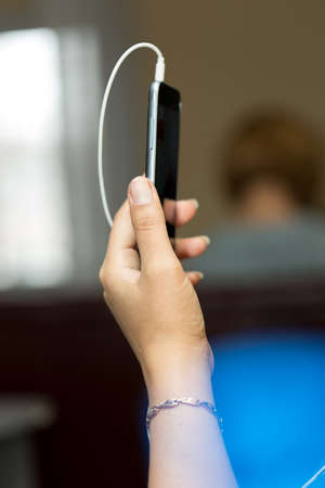 woman hand phoneの写真素材