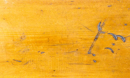 Close-up of a wooden bench in the sunshineの写真素材