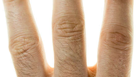 male finger close-up on a white backgroundの写真素材