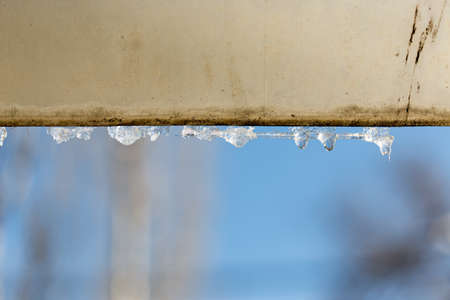 melting icicles with water dropsの写真素材