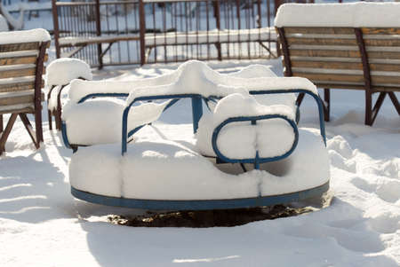 children's playground, a large torque ring in the snowの写真素材