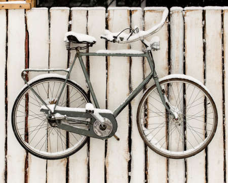 bicycle hanging in the fenceの写真素材