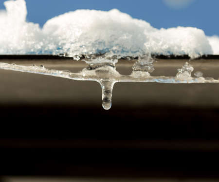 melting icicles with water dropsの写真素材