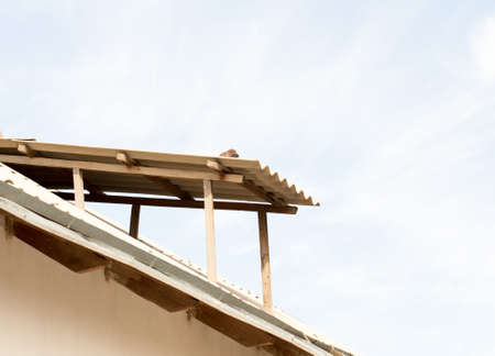 The window in the attic of an old houseの写真素材