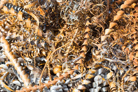 silver spirals of metal shavings as garbage, texture of different size of metal spirals shavings texture, metal shavings textureの写真素材