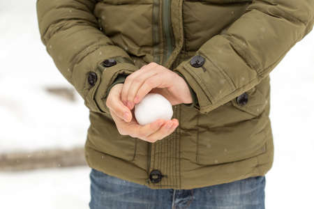 man throws snowの写真素材