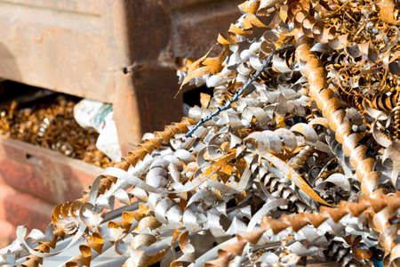 silver spirals of metal shavings as garbage, texture of different size of metal spirals shavings texture, metal shavings textureの写真素材