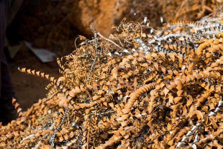 silver spirals of metal shavings as garbage, texture of different size of metal spirals shavings texture, metal shavings textureの写真素材