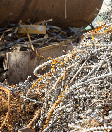 silver spirals of metal shavings as garbage, texture of different size of metal spirals shavings texture, metal shavings textureの写真素材