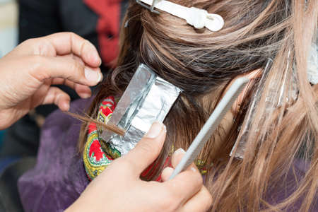 hair coloring in a beauty salonの写真素材