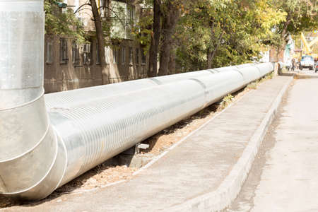 replacing the new pipe from the urban heatingの写真素材