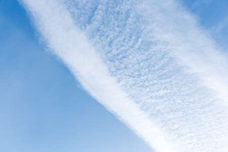 Airplane in cloudy skyの写真素材