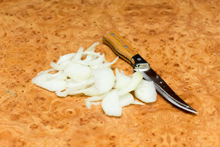 chopped onions on the tableの写真素材
