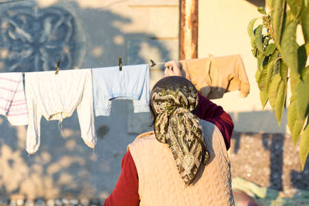 Woman hangs things