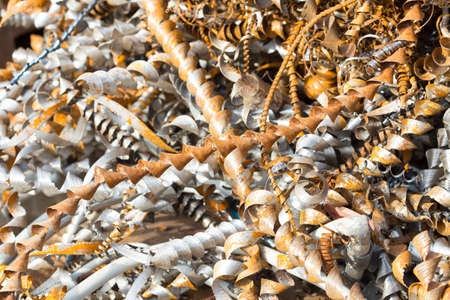 silver spirals of metal shavings as garbage, texture of different size of metal spirals shavings texture, metal shavings textureの写真素材