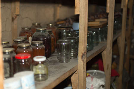 Old cans in the pantryの写真素材