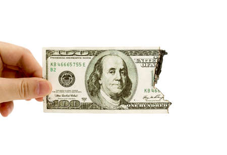 fire dollar on a white backgroundの写真素材