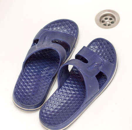 Rubber, gel slipper in white bathの写真素材