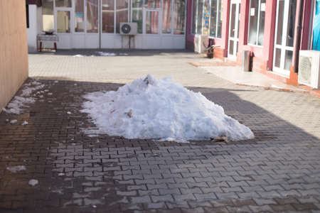 snow pile on the streetの写真素材