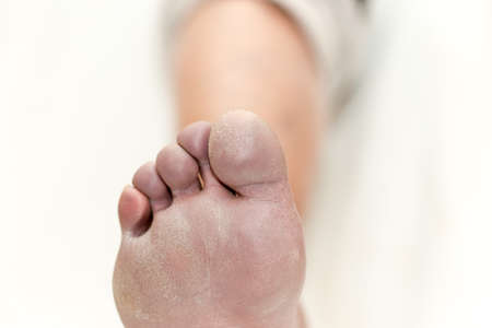 leg man close up, on a white backgroundの写真素材