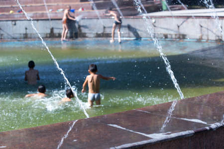 Children bathe in the pool of the cityのeditorial素材