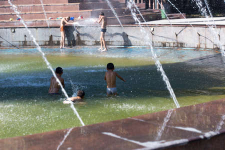 Children bathe in the pool of the cityのeditorial素材