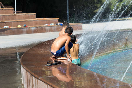 Children bathe in the pool of the cityのeditorial素材
