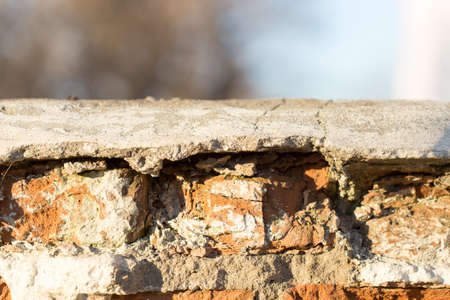 old brick on the fence close up