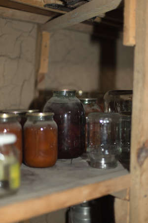 Old cans in the pantryの写真素材