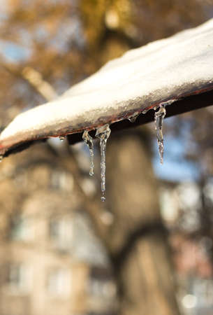 Icicles of ice in a canopyの写真素材