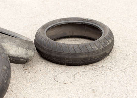 old car tire on asphalt