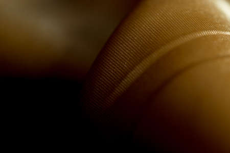 Background of yellow fabric silk macroの写真素材