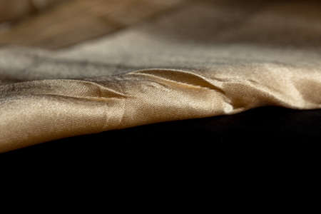 Background of yellow fabric silk macroの写真素材