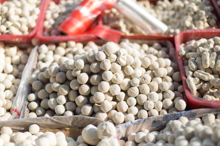 Kazakh national kurt, round, salted curd on the marketの写真素材