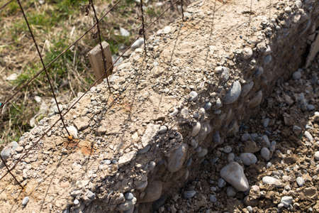 The effect of rain on a fresh concrete foundationの写真素材