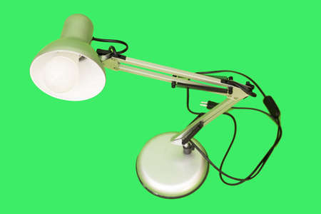 Table lamp isolated on a green backgroundの写真素材