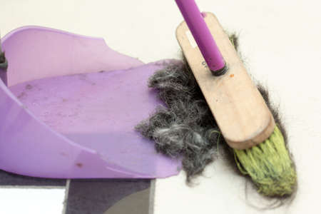 Sweeping hair in a hairdresser