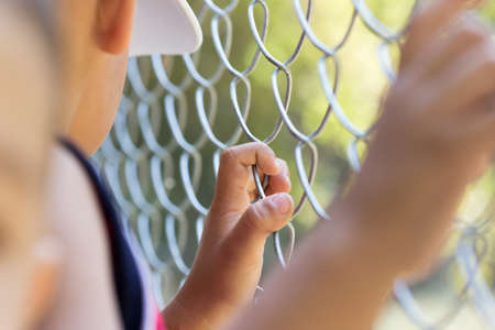 hand in an iron gridの写真素材