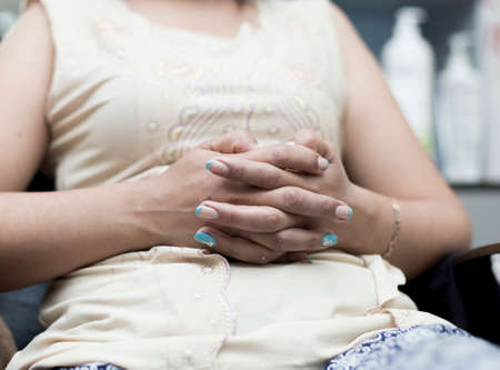 Hands of a girl after a manicureの写真素材