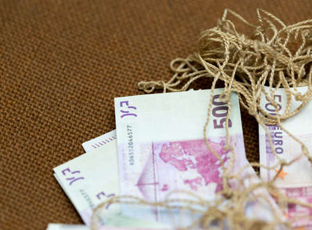 five hundred euros on a background mesh bagの写真素材