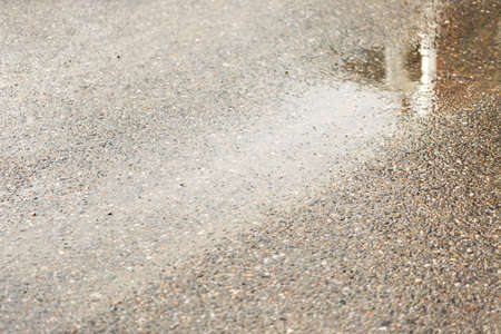 wet asphalt on the roadの写真素材